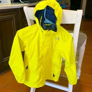 Yellow north face raincoat with navy interior barely worn!!
